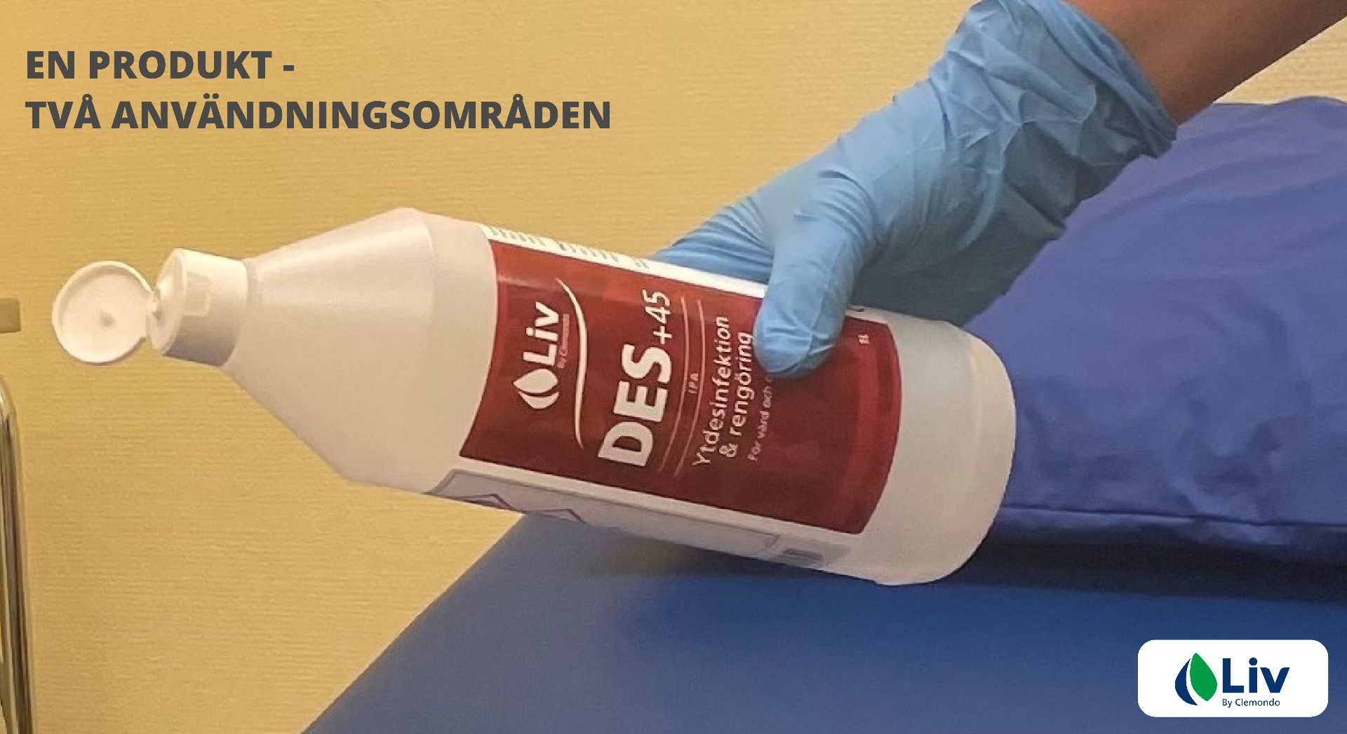 En hand som håller en flaska Liv Des 45
